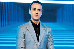 عکسی از علی کریمی در کنار بازیکن جنجالی تیم ملی!