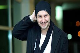 تصویر لو رفته از زن جواد عزتی با تیپ فوق اروپایی!/ست قرمز جگری مه لقا +عکس